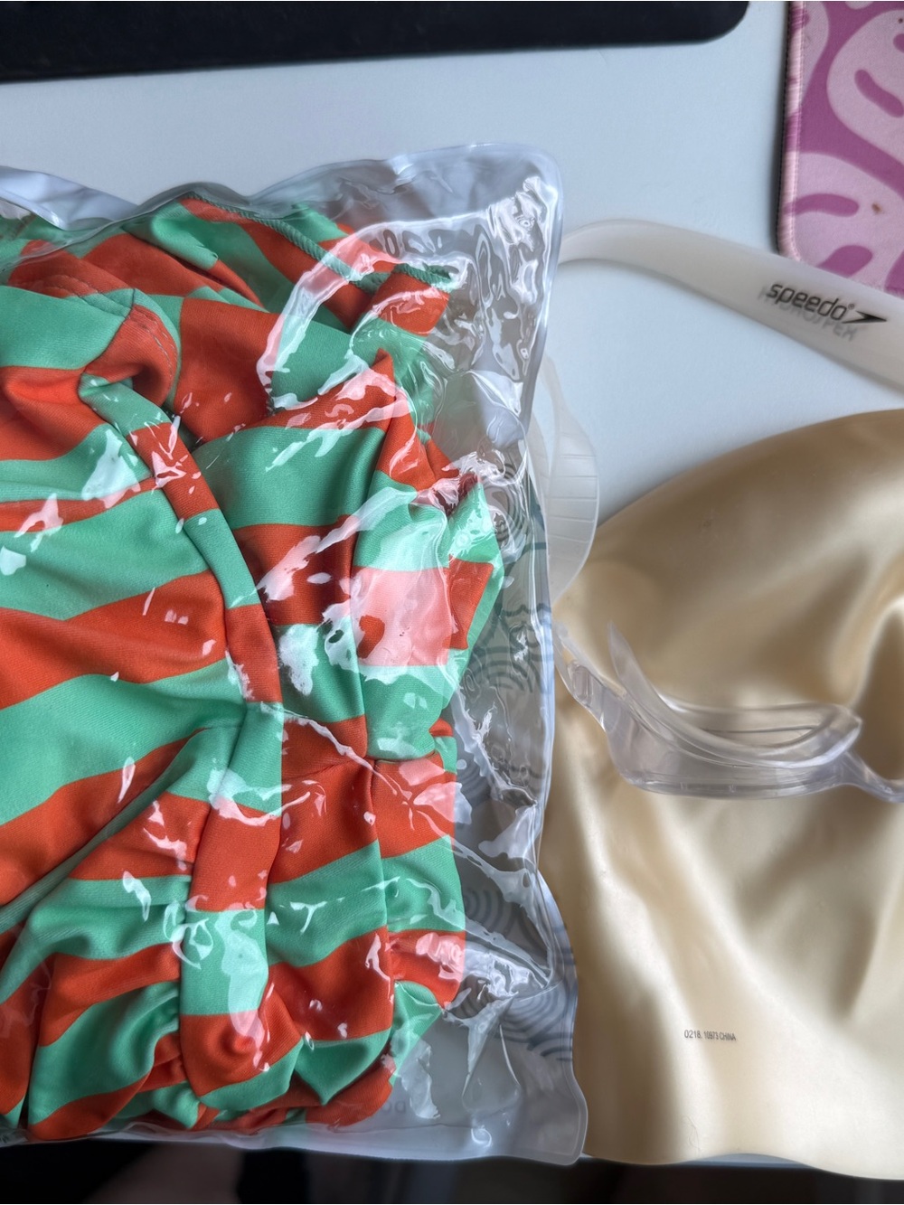One-Piece Padded Swimsuit in Stripes with Speedo Goggles and Swim Cap